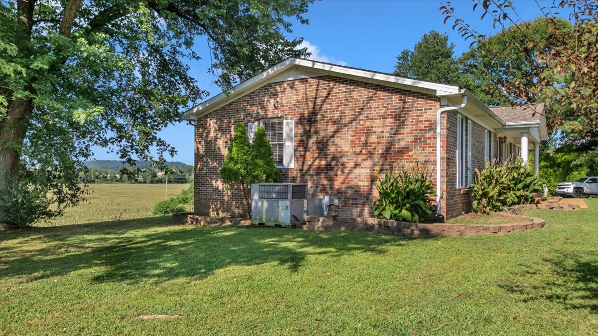 1660 Vales Mill Road Pulaski, TN 38478 - Photo 9 of 35 a view of a house with a yard