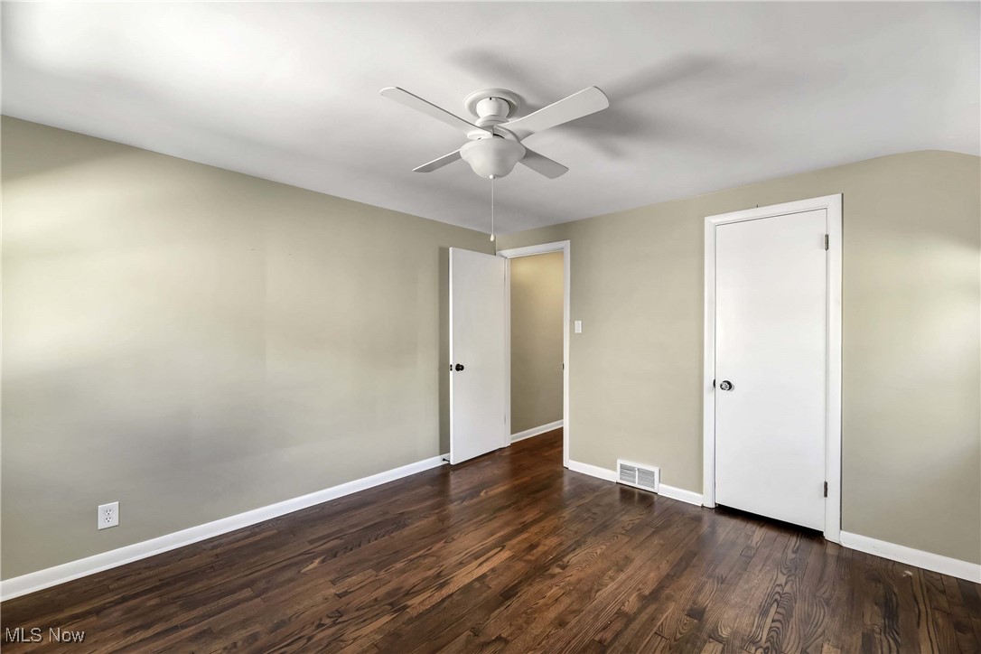 1204 Brainard Road Lyndhurst, OH 44124 - Photo 25 of 34 Unfurnished bedroom featuring ceiling fan and dark hardwood / wood-style floors