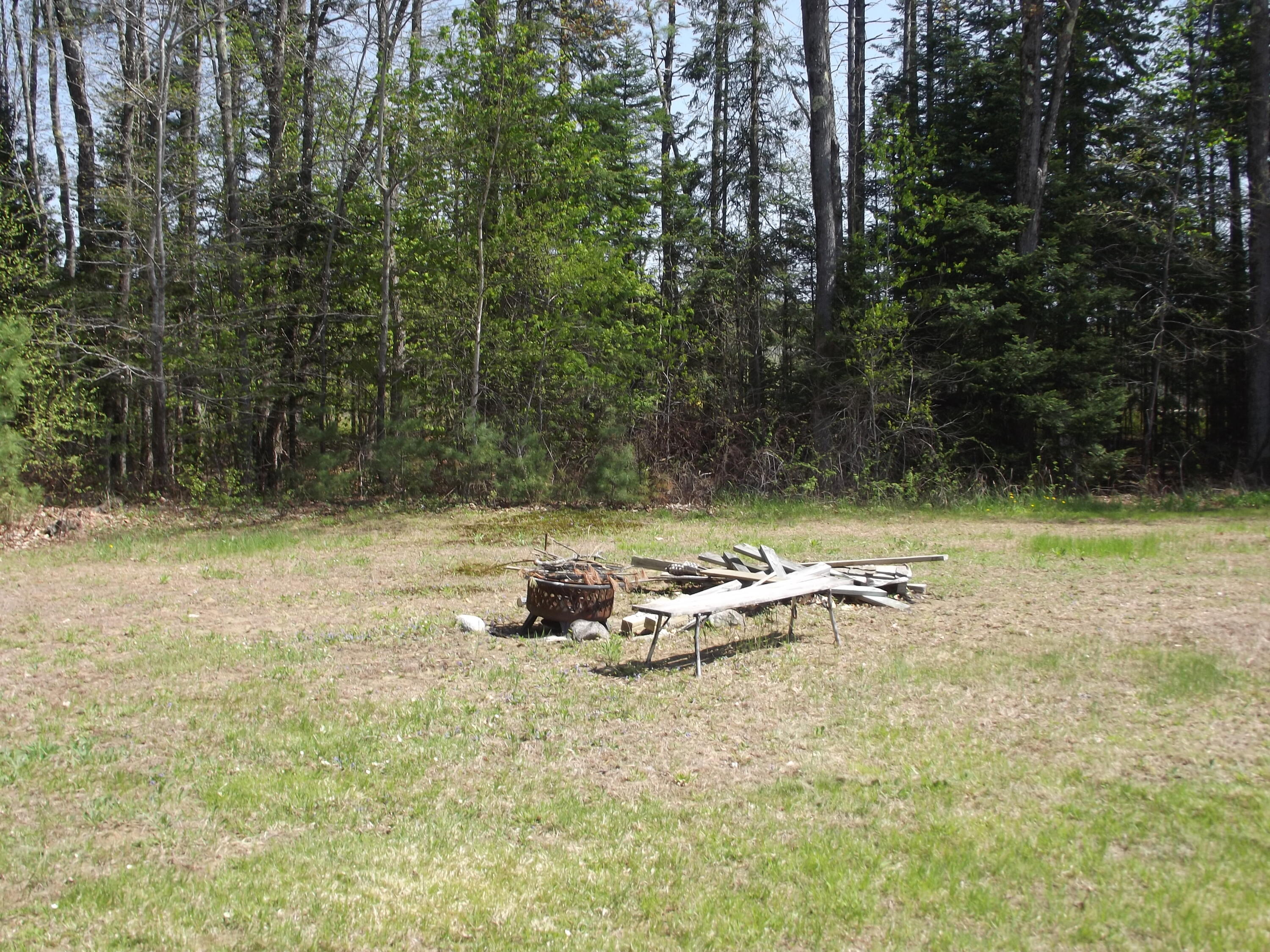 396 Waterville Road Norridgewock, ME 04957 - Photo 16 of 17 Backyard fire pit
