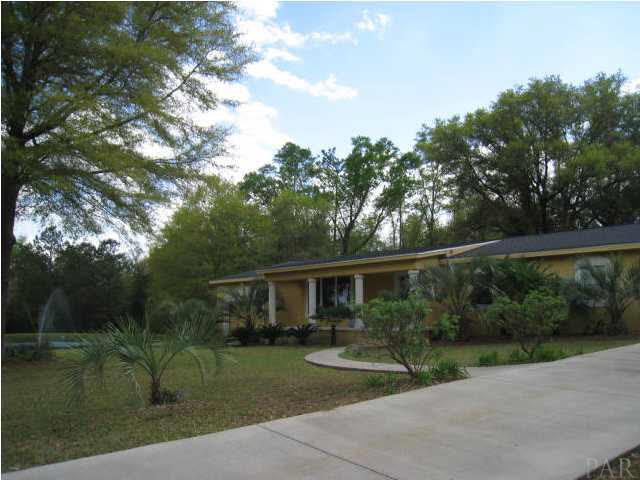 Welcome to 5402 Wiley Scott Rd. Jay, Fl. Notice the pond over to the left. Total Remodel!!! New Roof 2006.