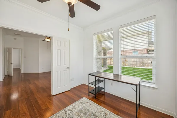 a view of a livingroom with furniture and wooden floor
