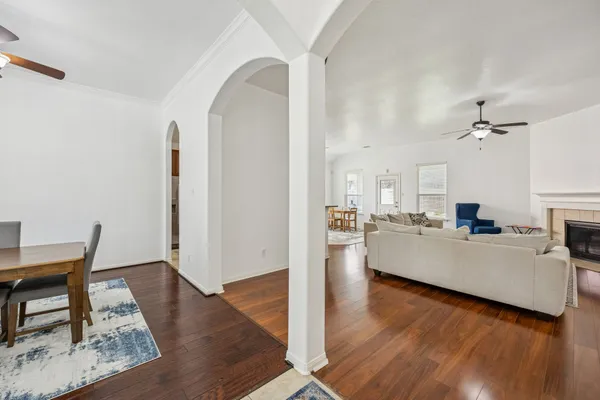 a view of a living room and kitchen view