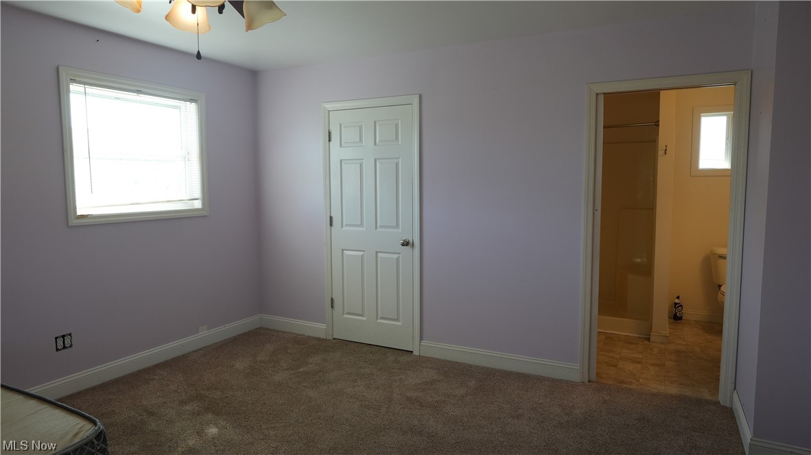 973 Archer Hill Road Colliers, WV 26035 - Photo 10 of 22 Unfurnished bedroom featuring carpet flooring and ceiling fan