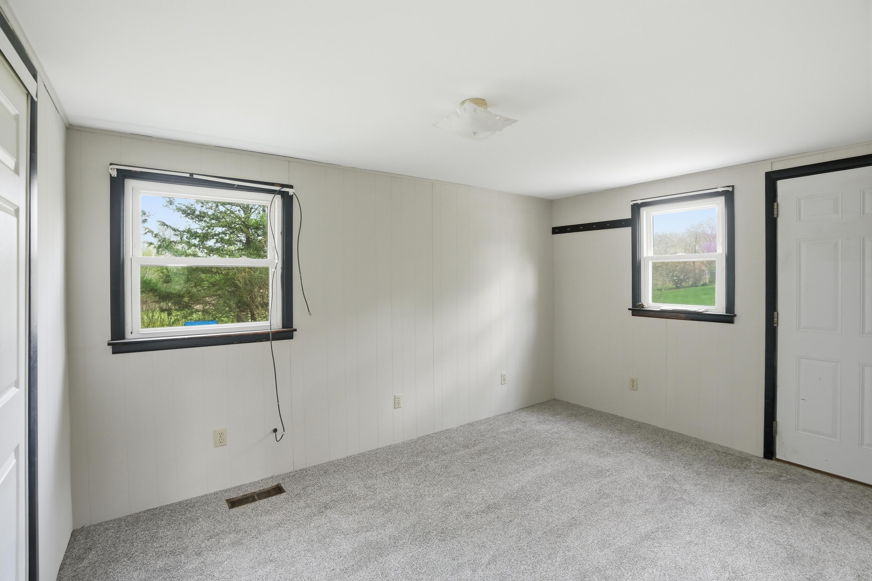 11131 Fathke Road Crown Point, IN 46307 - Photo 11 of 17 an empty room with windows and closet