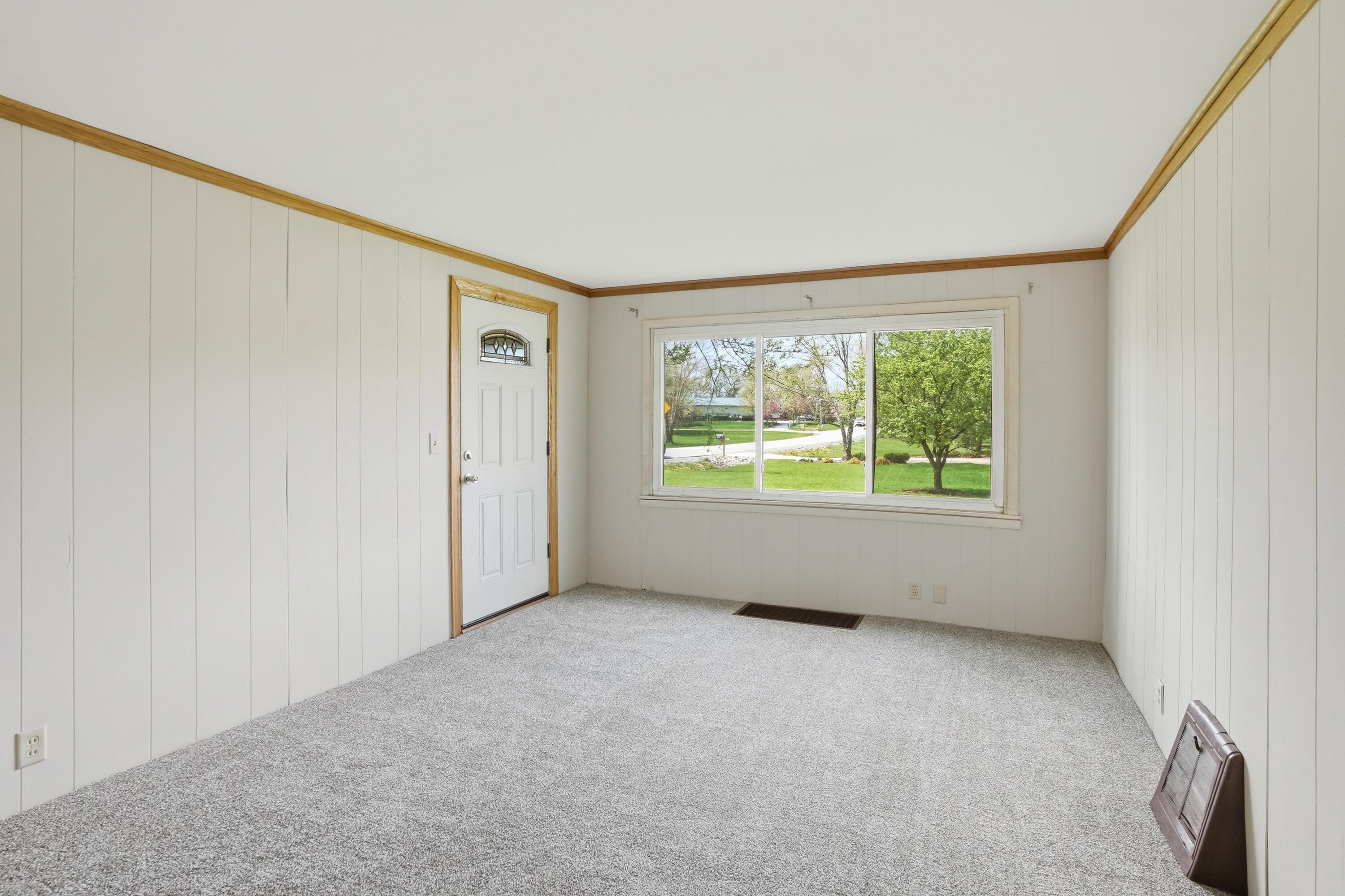 11131 Fathke Road Crown Point, IN 46307 - Photo 3 of 17 a view of an empty room with a window