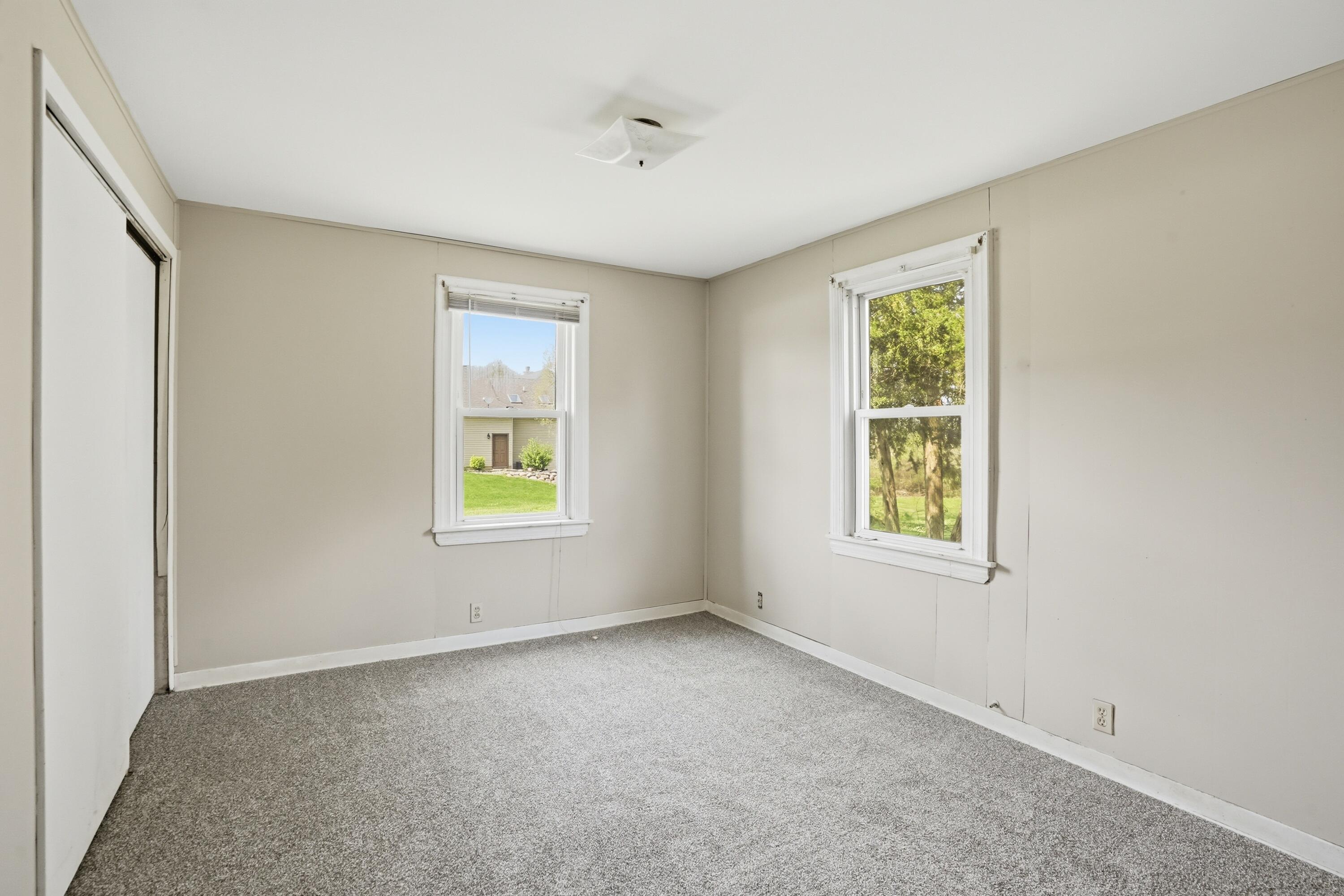11131 Fathke Road Crown Point, IN 46307 - Photo 10 of 17 an empty room with windows