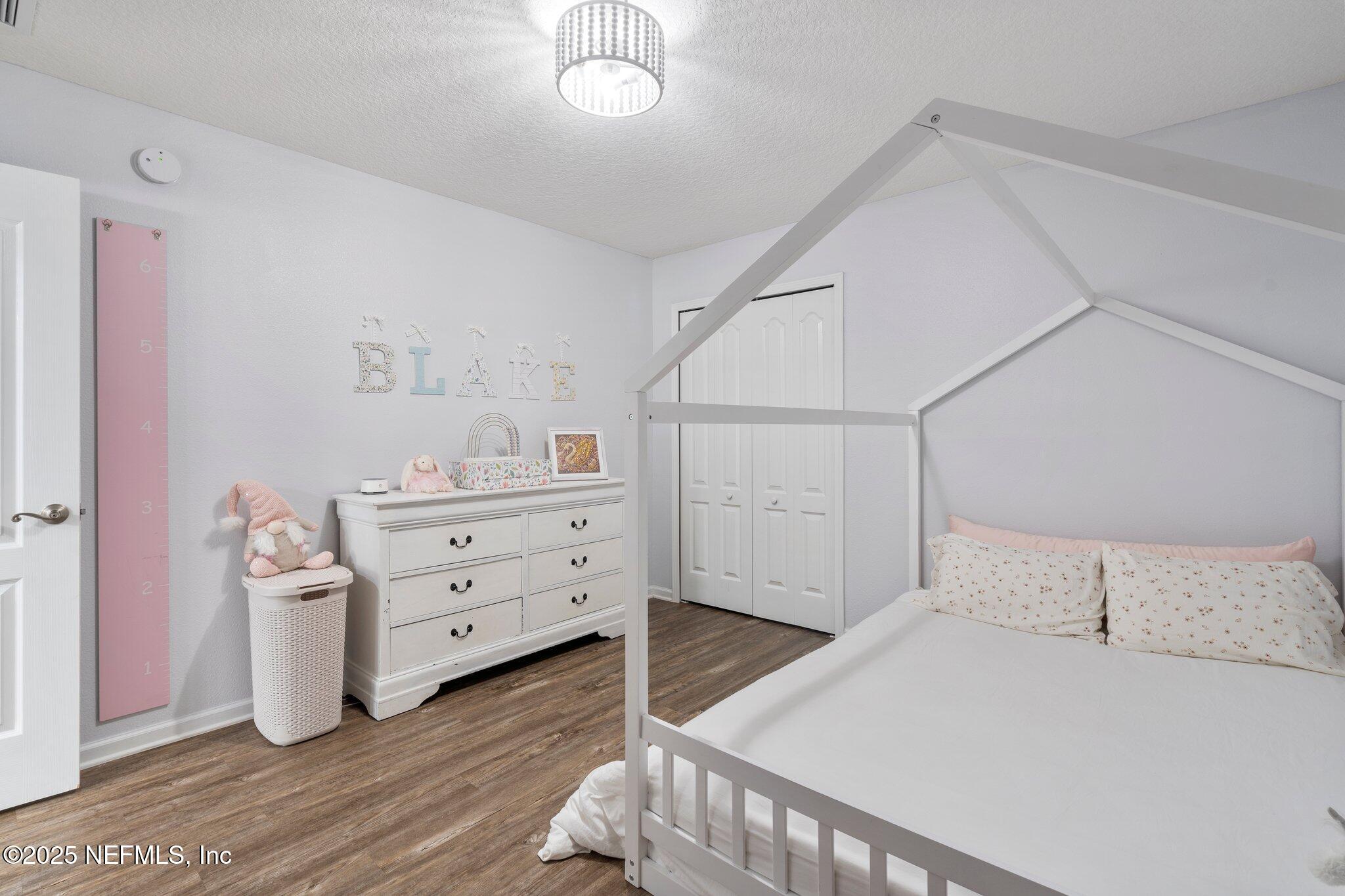 1309 Foxmeadow Trail Middleburg, FL 32068 - Photo 27 of 48 a view of a bedroom with cabinets
