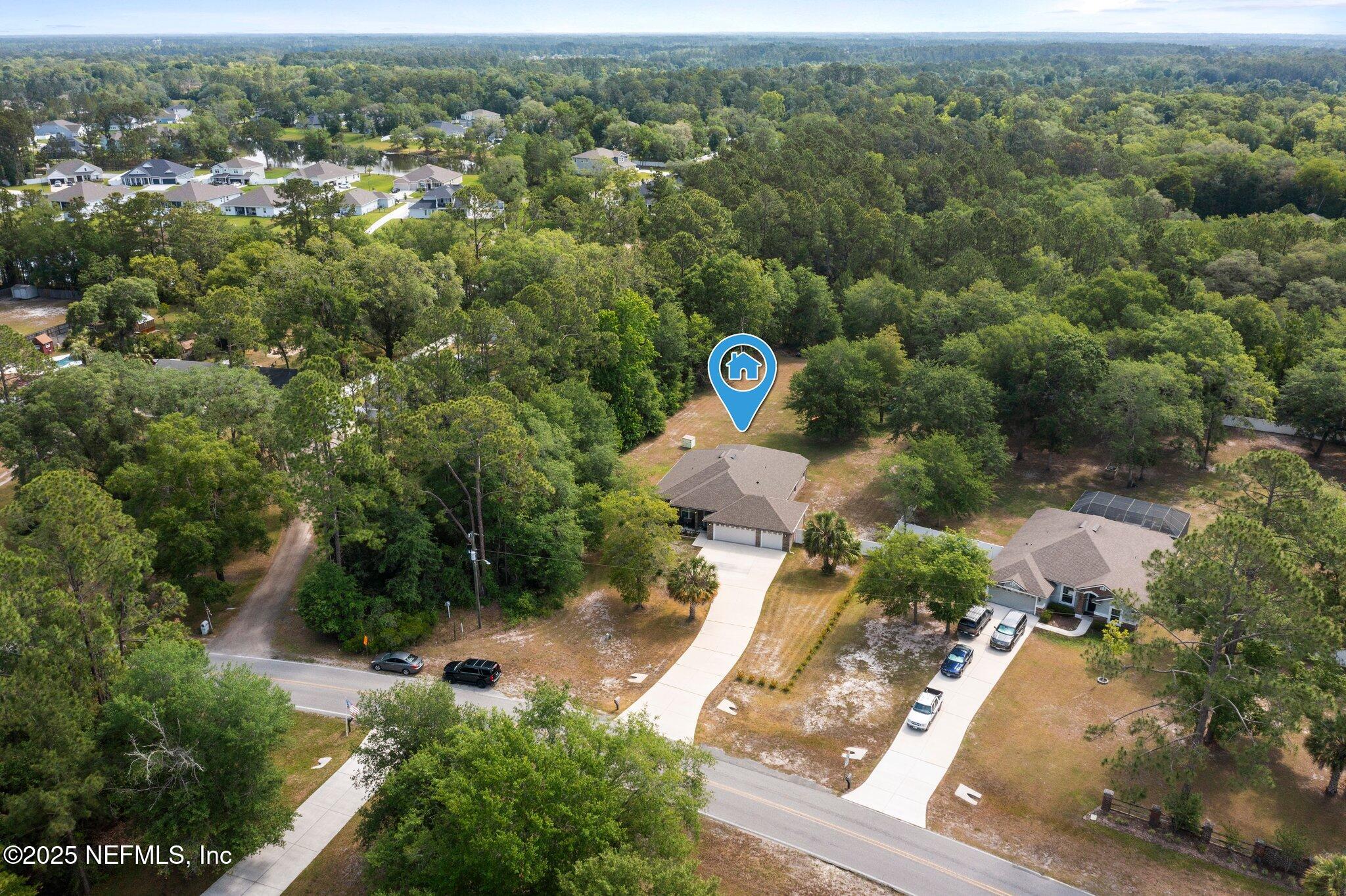 1309 Foxmeadow Trail Middleburg, FL 32068 - Photo 37 of 48 an aerial view of a house with a yard