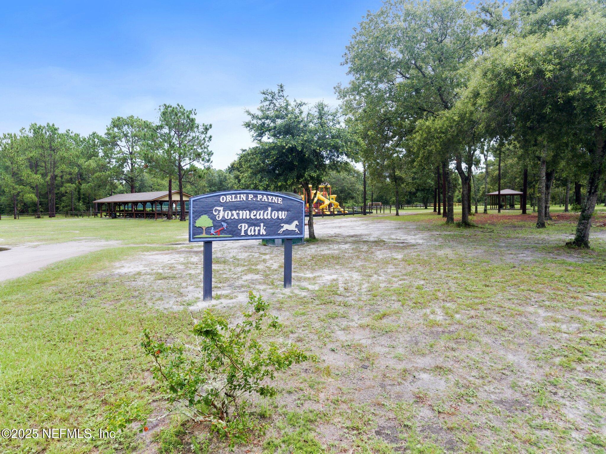1309 Foxmeadow Trail Middleburg, FL 32068 - Photo 40 of 48 a backyard of a house with lots of green space