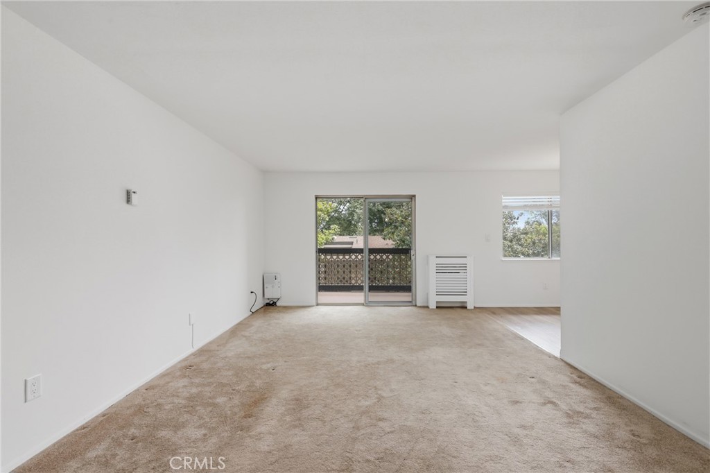 12200 Montecito Road, Unit D301 Seal Beach, CA 90740 - Photo 2 of 28 an empty room with windows