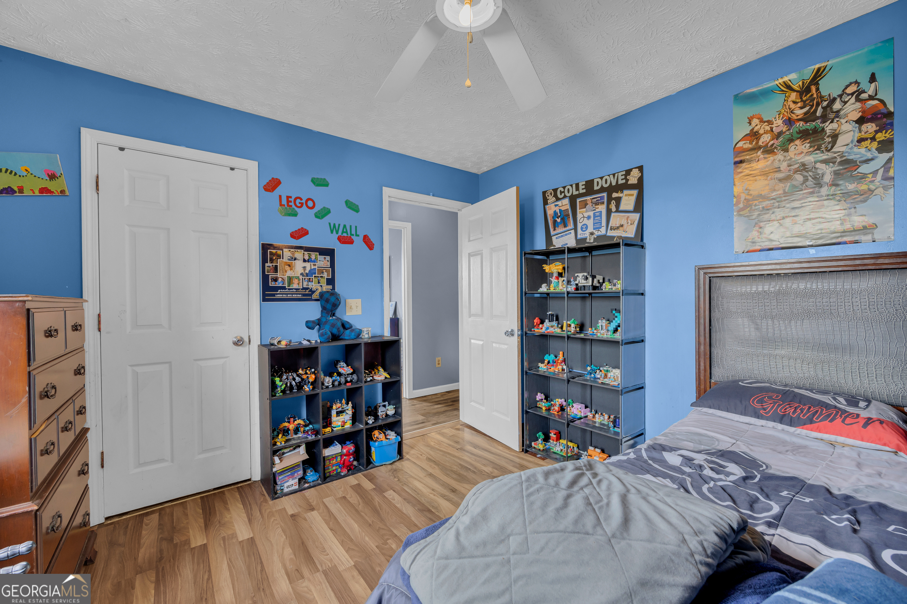 156 Shirley Road Royston, GA 30662 - Photo 19 of 29 a bedroom with a bed and a bookshelf