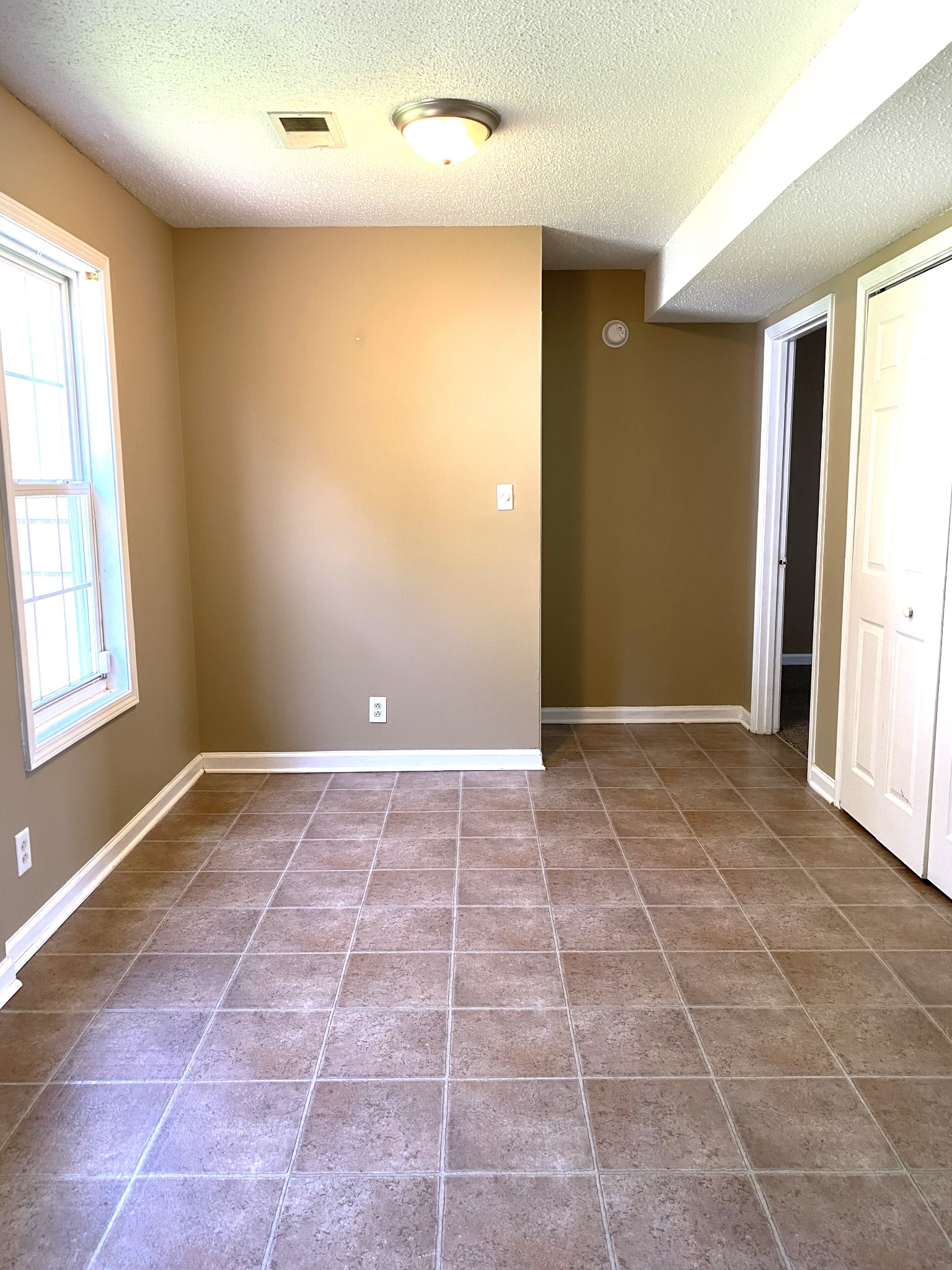 1009 Shadow Ridge Avenue Oak Grove, KY 42262 - Photo 5 of 14 a view of an empty room and window