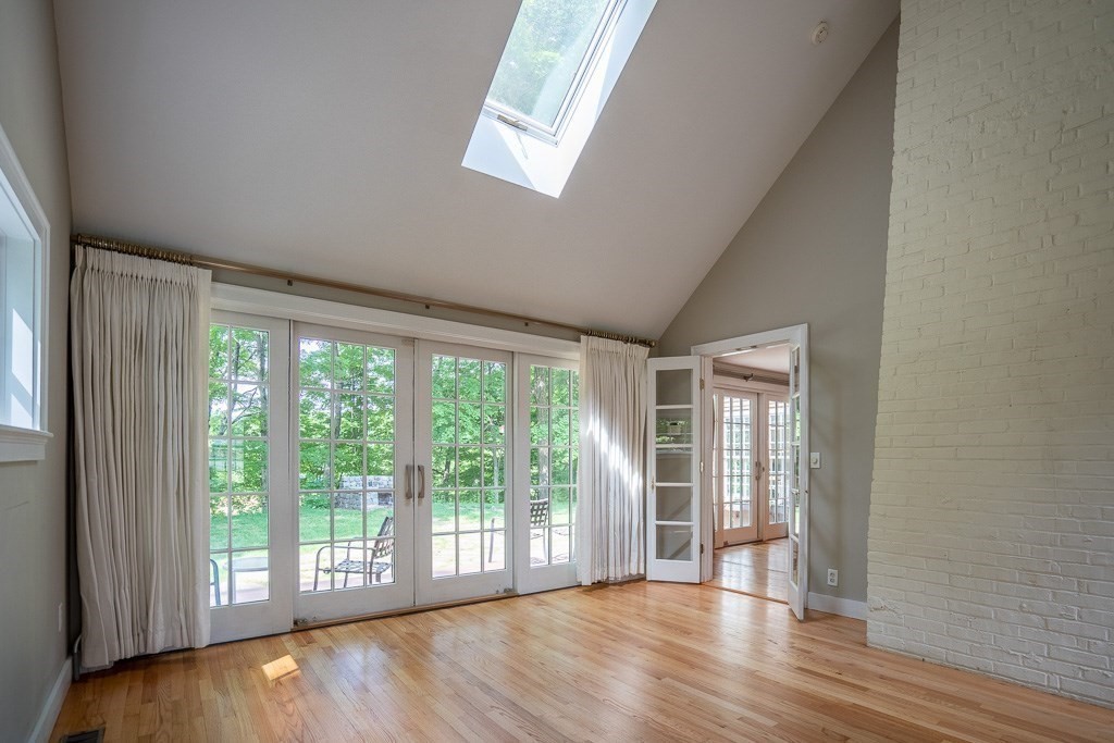 20 Hayward Road Northampton, MA 01062 - Photo 14 of 35 a view of an empty room with wooden floor and a window