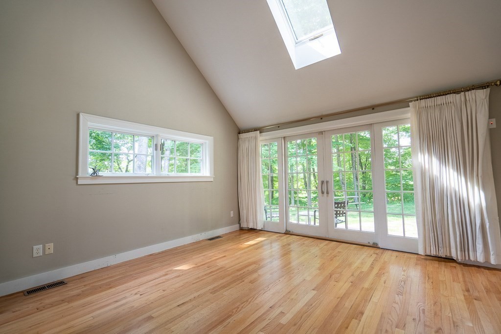 20 Hayward Road Northampton, MA 01062 - Photo 17 of 35 a view of an empty room with wooden floor and a window