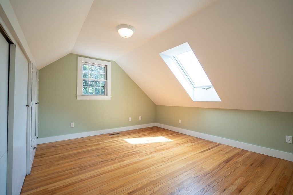 20 Hayward Road Northampton, MA 01062 - Photo 21 of 35 an empty room with wooden floor and windows