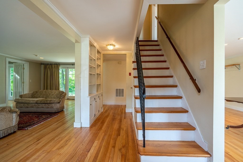 20 Hayward Road Northampton, MA 01062 - Photo 4 of 35 a view of a hallway with wooden floor and windows