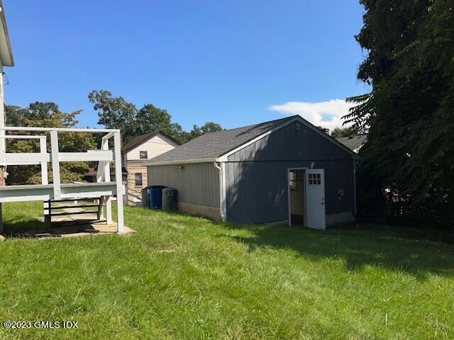 218 Pemberwick Road, Unit 2 Greenwich, CT 06831 - Photo 12 of 20 a view of a house with a yard and sitting area