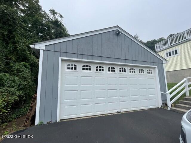 218 Pemberwick Road, Unit 2 Greenwich, CT 06831 - Photo 13 of 20 a view of a house with a street