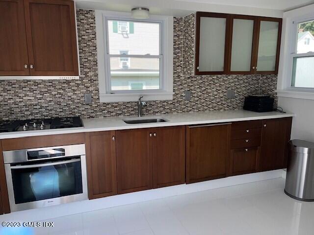218 Pemberwick Road, Unit 2 Greenwich, CT 06831 - Photo 2 of 20 a kitchen with a sink and a stove
