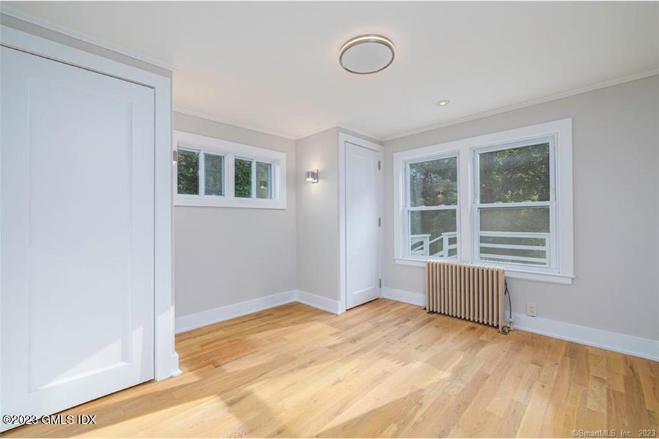 218 Pemberwick Road, Unit 2 Greenwich, CT 06831 - Photo 5 of 20 a view of an empty room with a window