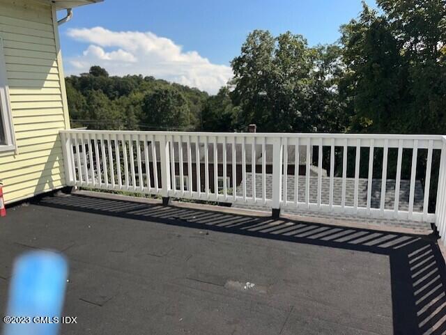 218 Pemberwick Road, Unit 2 Greenwich, CT 06831 - Photo 9 of 20 a view of a chair in a patio