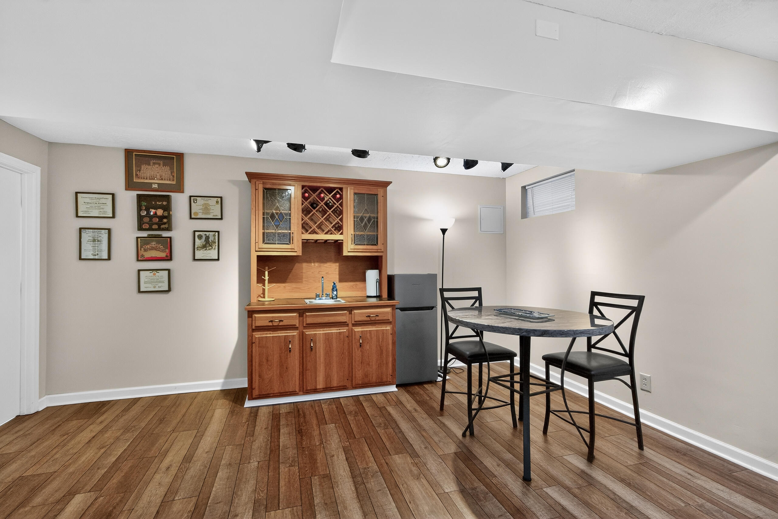 216 Meadow Valley Road Lexington, KY 40511 - Photo 25 of 35 Basement. 16x12 Space w/Wet bar. NEW LVP Flooring.