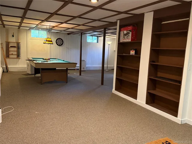 a view of an empty room with closet