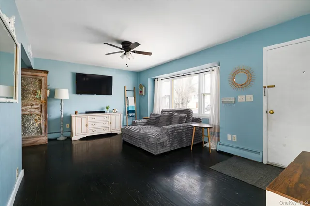 a bedroom with furniture and window