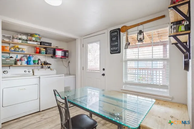 a workspace with furniture and window