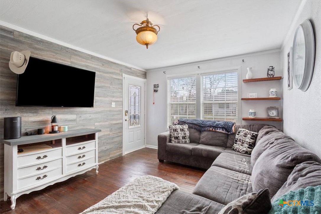 2909 June Street Killeen, TX 76543 - Photo 5 of 20 a living room with furniture and a flat screen tv