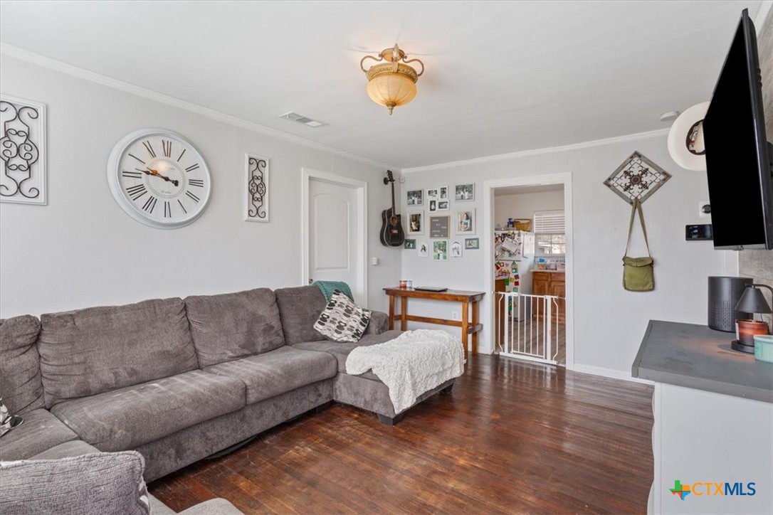 2909 June Street Killeen, TX 76543 - Photo 7 of 20 a living room with furniture and a flat screen tv