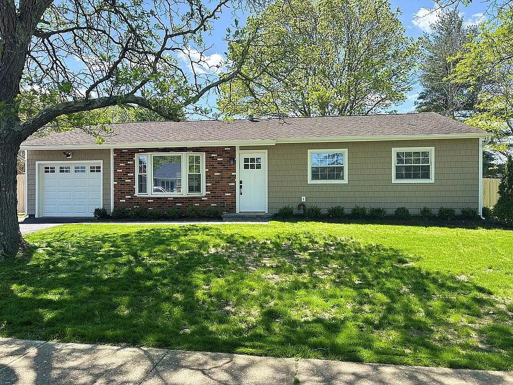86 Inverness Road Holbrook, NY 11741 - Photo 1 of 1 front view of a house with a yard