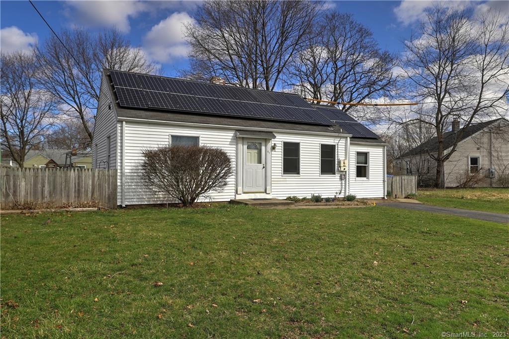 47 Piper Road Hamden, CT 06514 - Photo 1 of 1 a front view of a house with a garden