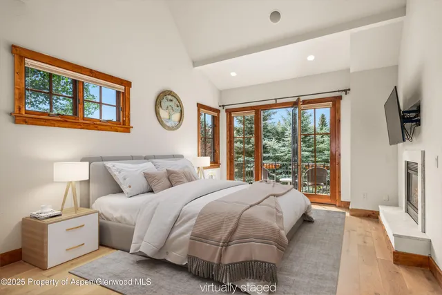 an aerial view of a house with a big yard