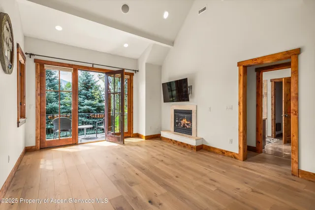 an aerial view of residential houses and outdoor space