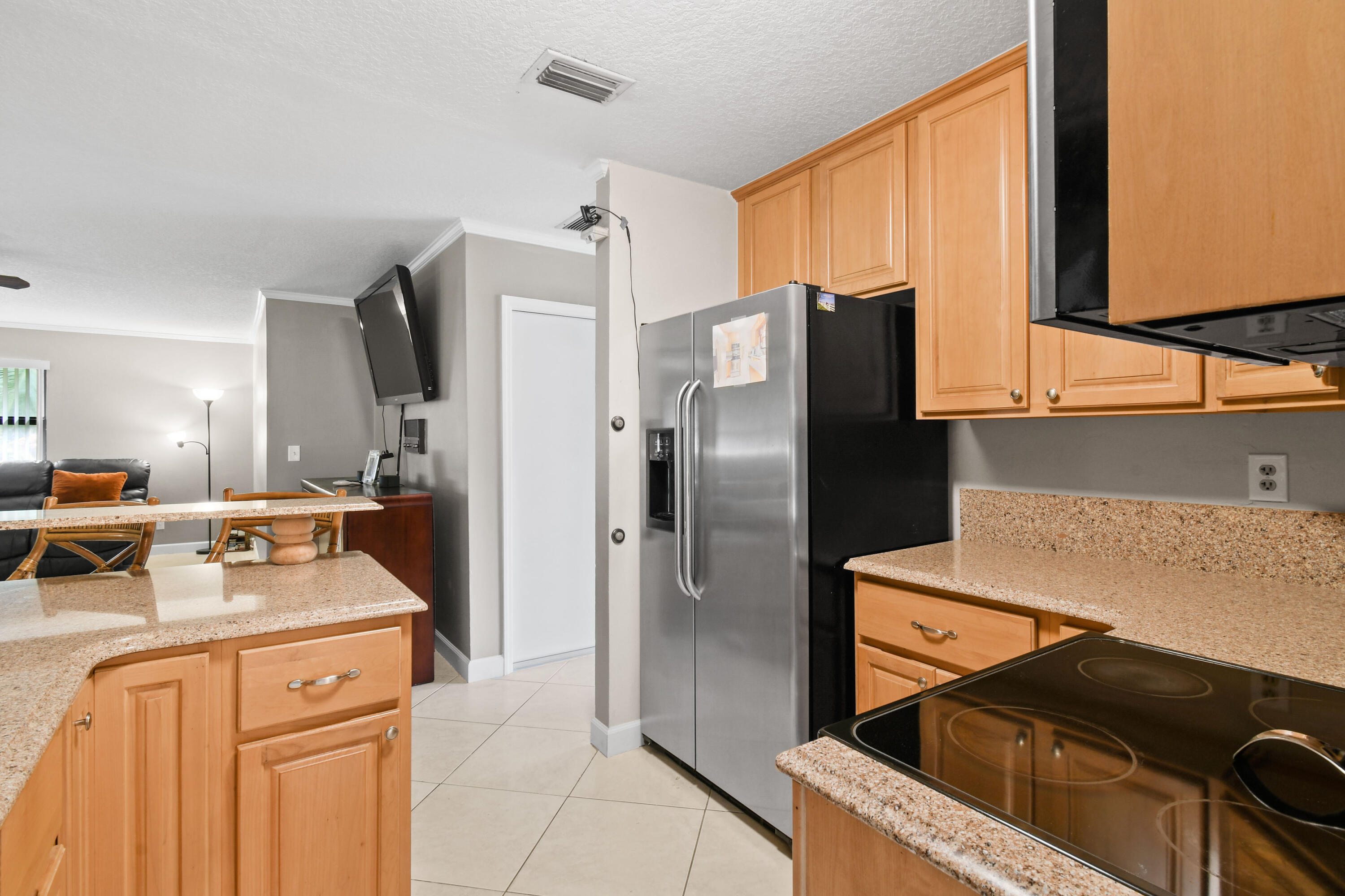 7107 181st Street Jupiter, FL 33458 - Photo 16 of 62 Kitchen with granite counters