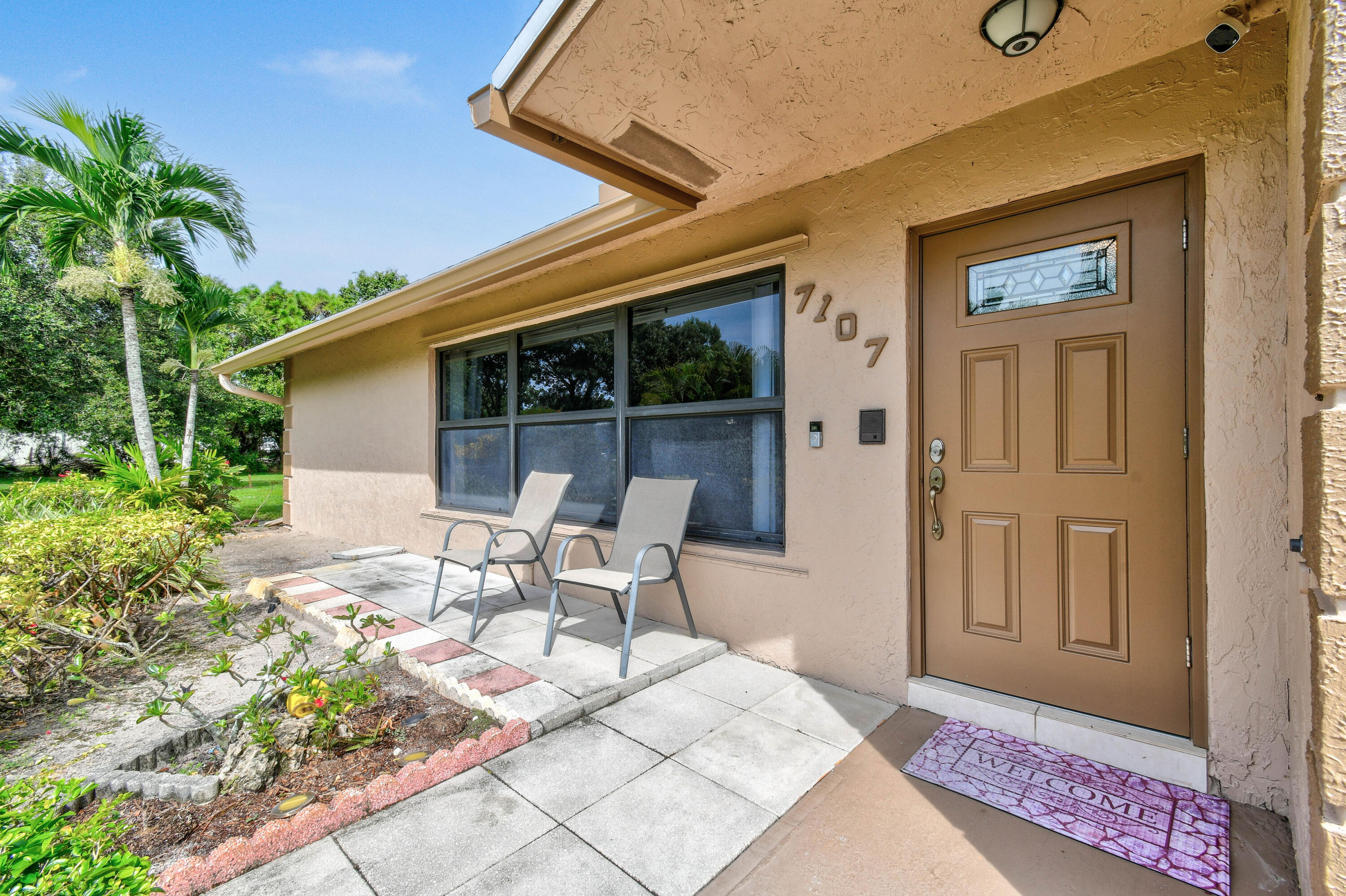 7107 181st Street Jupiter, FL 33458 - Photo 2 of 62 Covered front entry