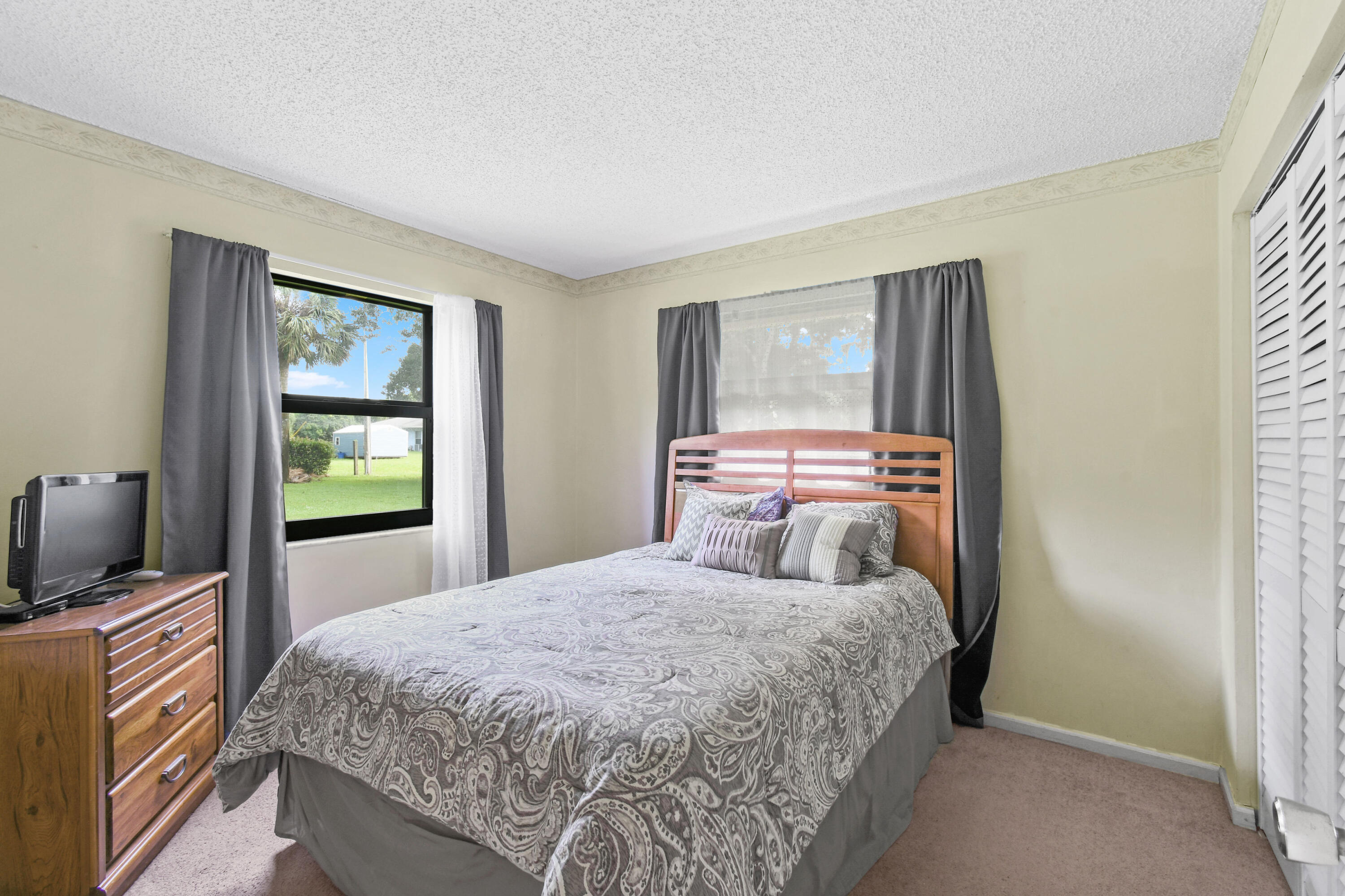 7107 181st Street Jupiter, FL 33458 - Photo 32 of 62 Guest bedroom