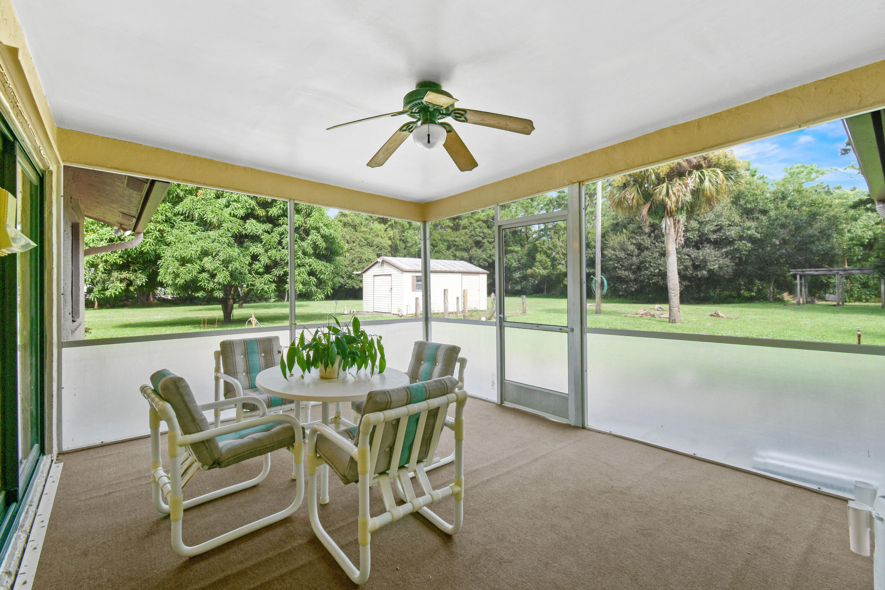 7107 181st Street Jupiter, FL 33458 - Photo 37 of 62 Covered and screened lanai