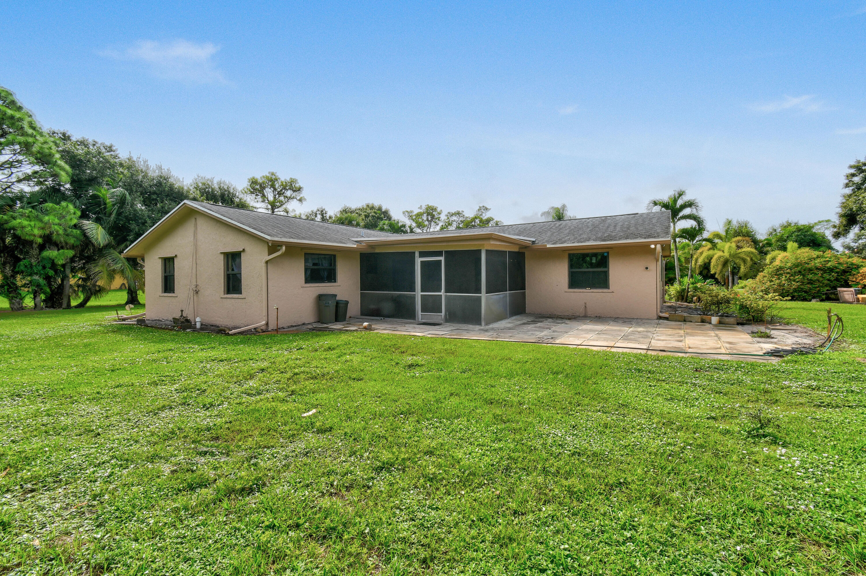 7107 181st Street Jupiter, FL 33458 - Photo 40 of 62 Large backyard and patio area