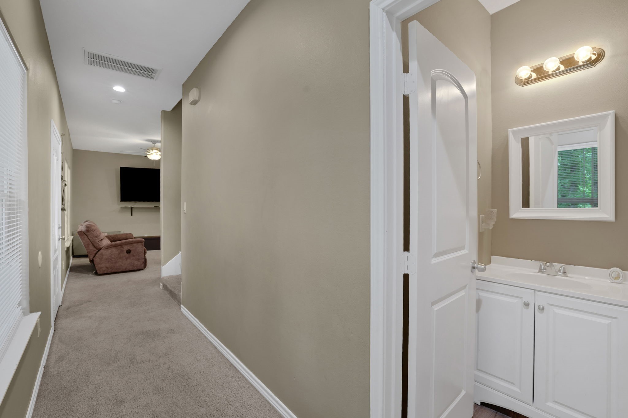 97 Harrell Road Coldspring, TX 77331 - Photo 16 of 31 On the first floor there is also a half bathroom