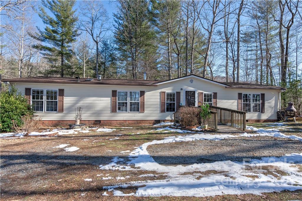 184 Terrys Gap Loop Road Fletcher, NC 28732 - Photo 1 of 28 a front view of a house with a yard