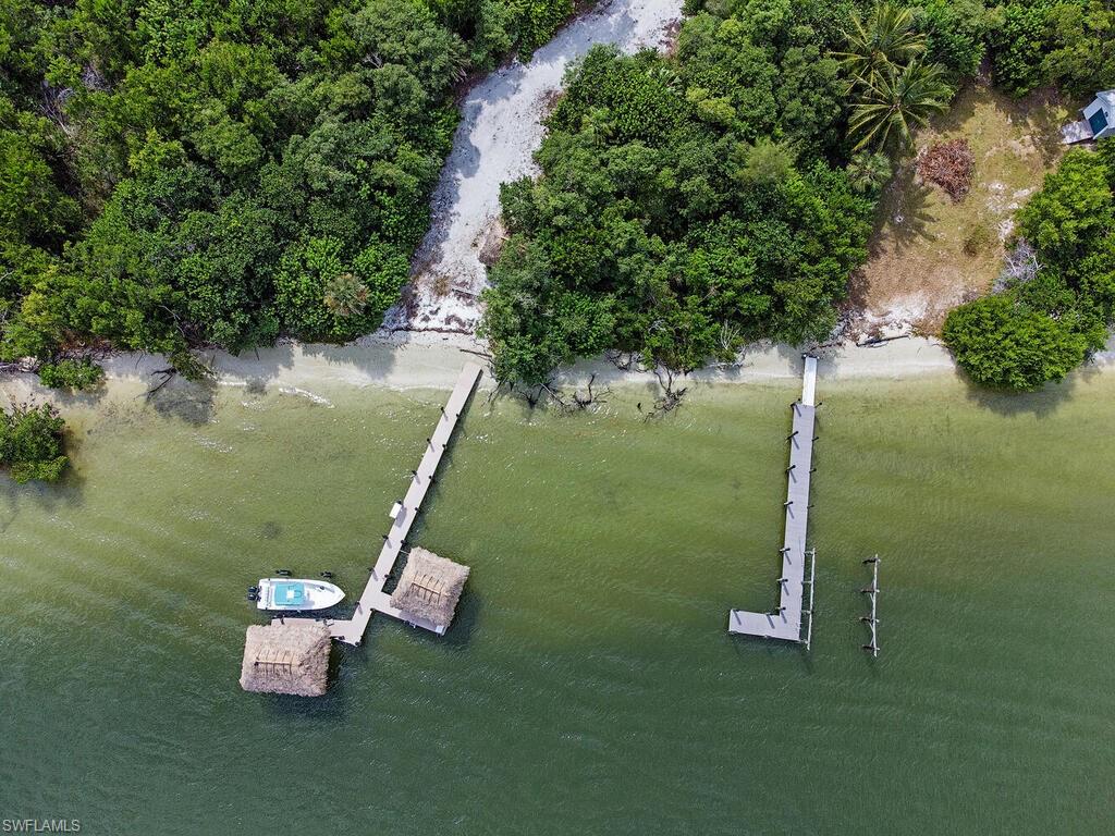 11231 Keewaydin Island Naples, FL 34113 - Photo 18 of 27 a lake view with a trees