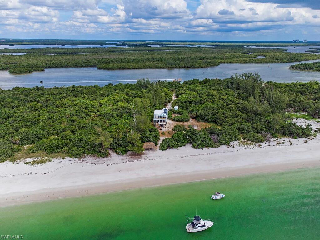 11231 Keewaydin Island Naples, FL 34113 - Photo 19 of 27 a view of a lake with outdoor space