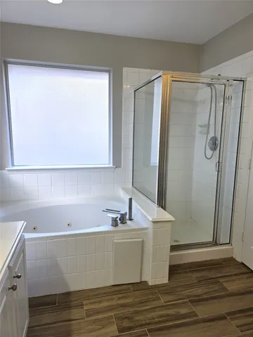 a room with a sink and a mirror