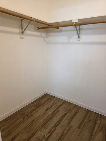 a view of a room with racks on the wall