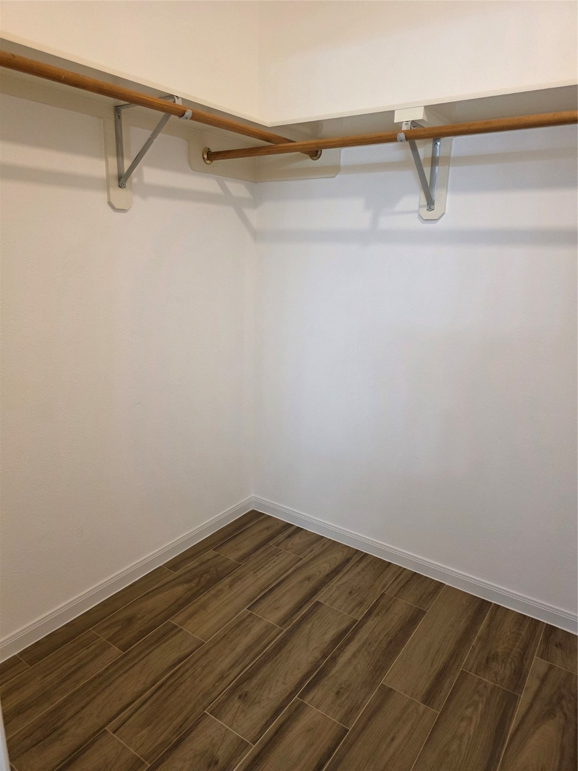 14925 Cypress Ridge Grove Lane Cypress, TX 77429 - Photo 13 of 30 a view of a room with racks on the wall