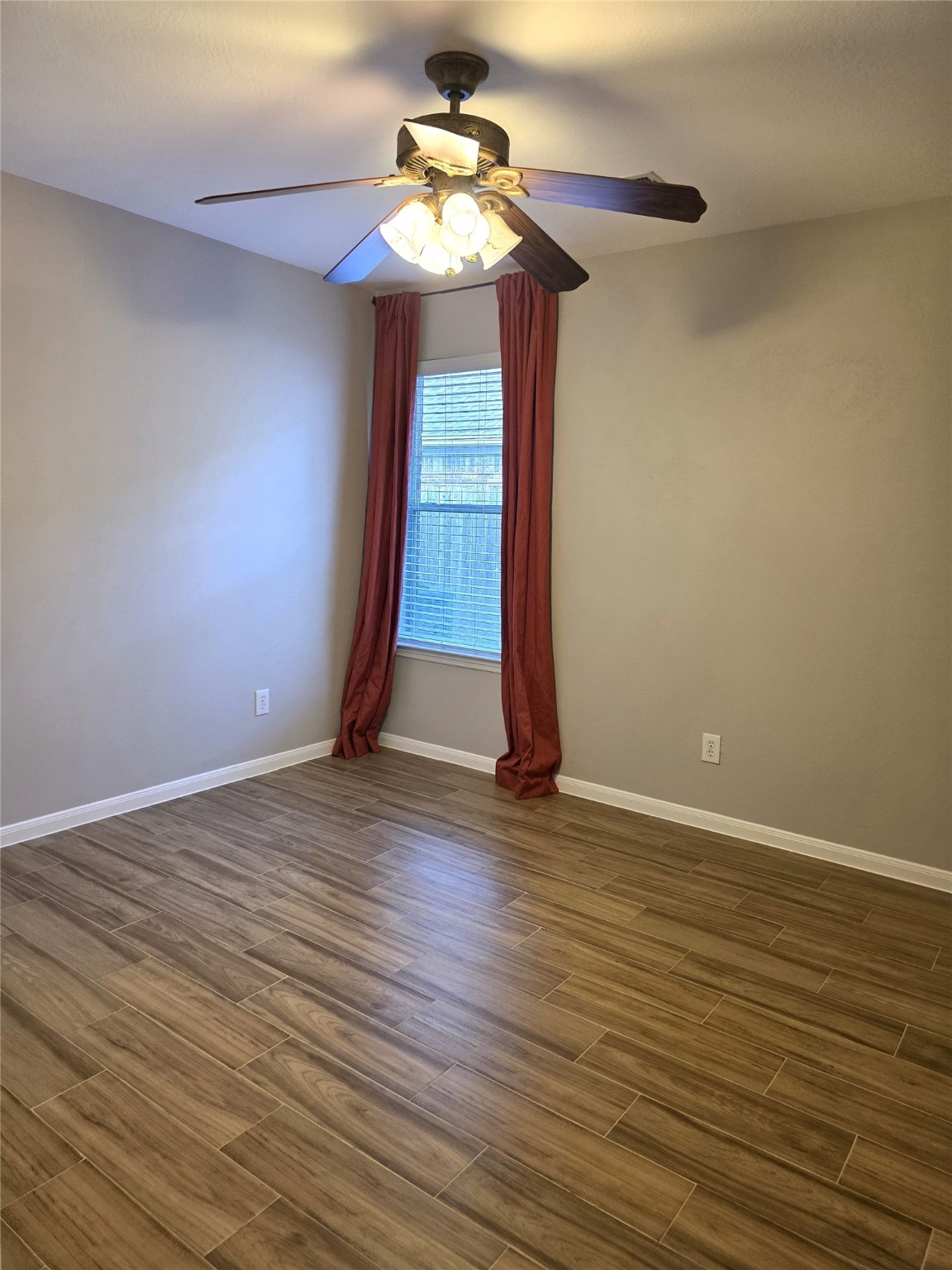 14925 Cypress Ridge Grove Lane Cypress, TX 77429 - Photo 15 of 30 a view of an empty room with a window