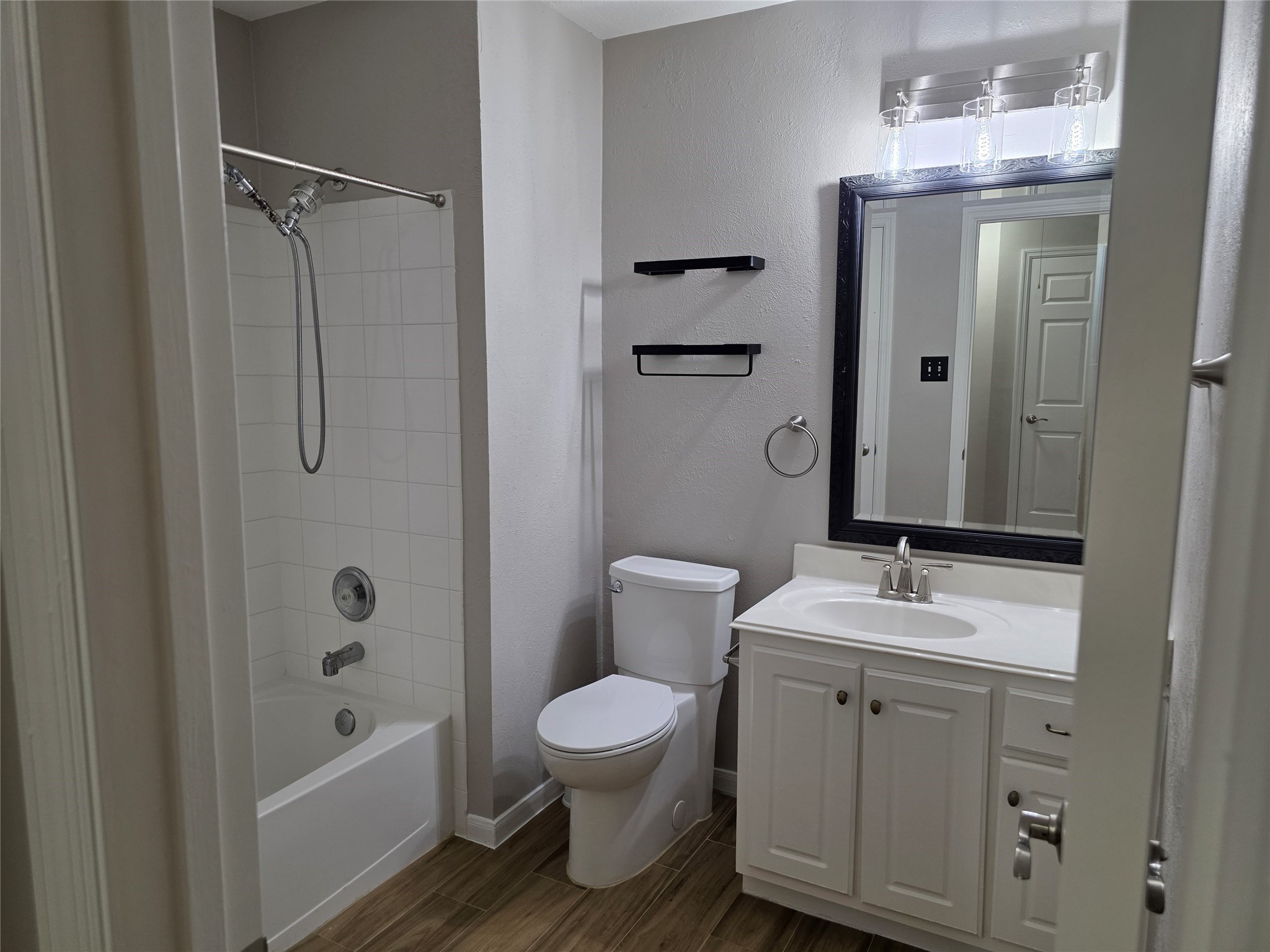 14925 Cypress Ridge Grove Lane Cypress, TX 77429 - Photo 17 of 30 a bathroom with a granite countertop sink toilet and shower