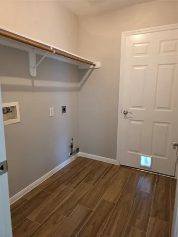 a view of small space with wooden floor